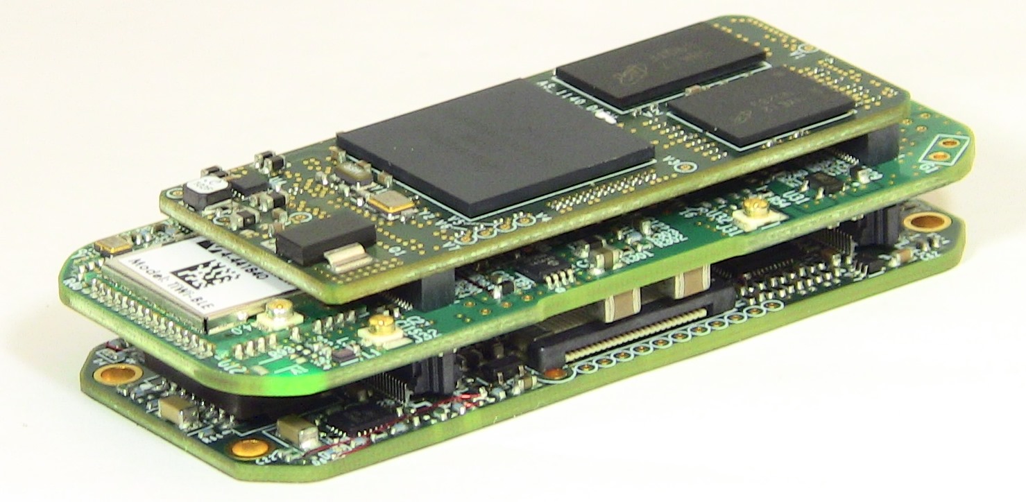 SideBridge SOM (shown on top) connected to a carrier board stack for M2M and IoT applications